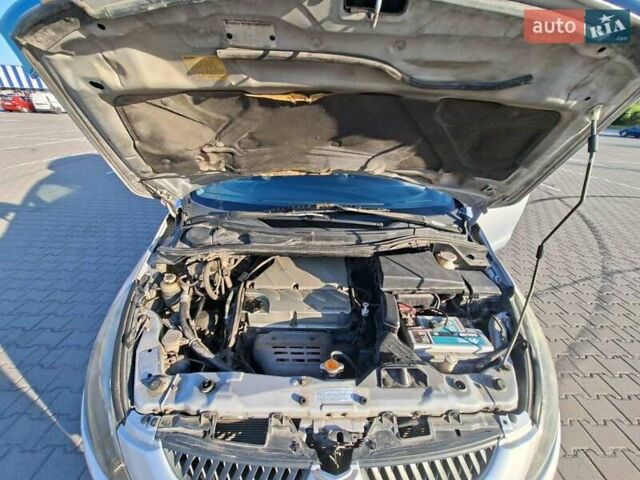 Серый Мицубиси Грандис, объемом двигателя 2.38 л и пробегом 215 тыс. км за 4619 $, фото 33 на Automoto.ua