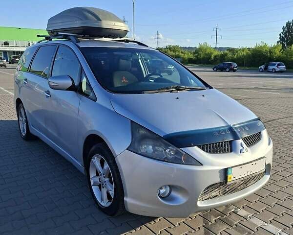 Серый Мицубиси Грандис, объемом двигателя 2.38 л и пробегом 215 тыс. км за 4619 $, фото 2 на Automoto.ua