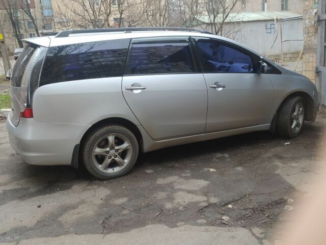 Серый Мицубиси Грандис, объемом двигателя 2.4 л и пробегом 260 тыс. км за 5700 $, фото 2 на Automoto.ua