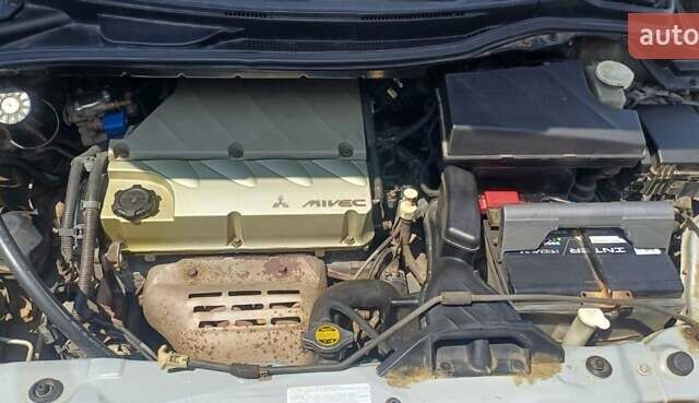 Серый Мицубиси Грандис, объемом двигателя 2.4 л и пробегом 312 тыс. км за 6800 $, фото 5 на Automoto.ua