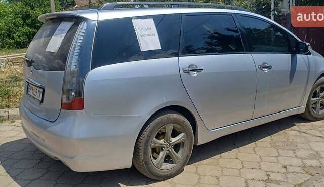 Серый Мицубиси Грандис, объемом двигателя 2.4 л и пробегом 312 тыс. км за 6800 $, фото 3 на Automoto.ua