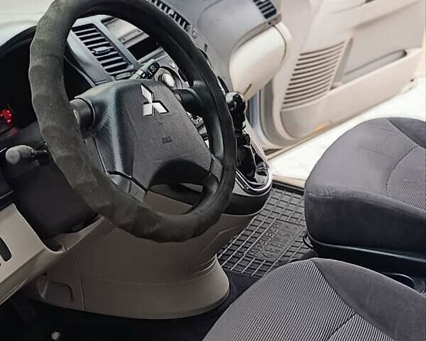 Міцубісі Грандіс 2006 у Хмельнике на Automoto.ua Сірий Міцубісі Грандіс, об'ємом двигуна 2 л та пробігом 252 тис. км за 5600 $, фото 10 на Automoto.ua