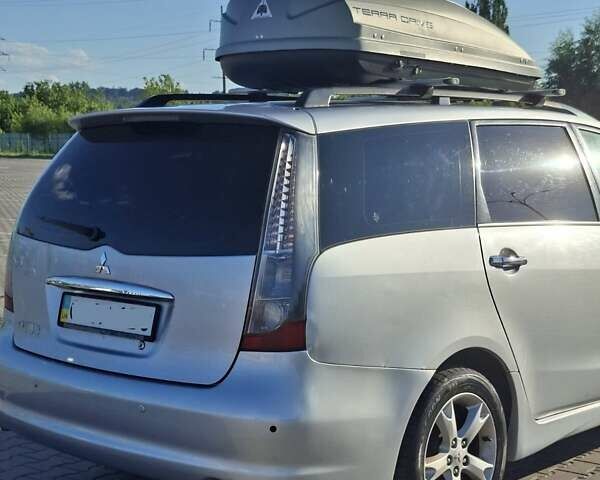 Серый Мицубиси Грандис, объемом двигателя 2.38 л и пробегом 215 тыс. км за 4619 $, фото 22 на Automoto.ua