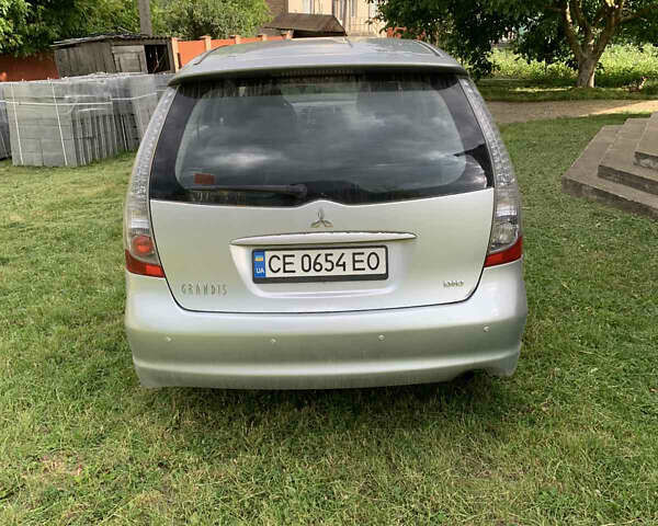 Серый Мицубиси Грандис, объемом двигателя 1.97 л и пробегом 394 тыс. км за 5600 $, фото 3 на Automoto.ua