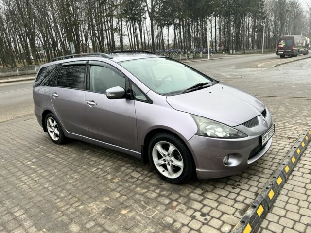 Серый Мицубиси Грандис, объемом двигателя 2.4 л и пробегом 210 тыс. км за 6800 $, фото 1 на Automoto.ua