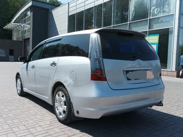 Серый Мицубиси Грандис, объемом двигателя 2.4 л и пробегом 245 тыс. км за 5100 $, фото 2 на Automoto.ua