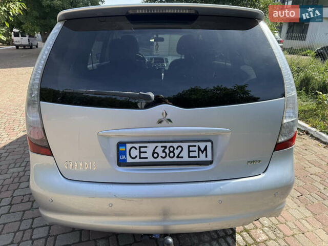 Серый Мицубиси Грандис, объемом двигателя 1.97 л и пробегом 219 тыс. км за 4999 $, фото 3 на Automoto.ua