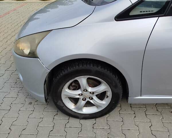 Міцубісі Грандіс 2006 у Мукачеве на Automoto.ua Сірий Міцубісі Грандіс, об'ємом двигуна 2 л та пробігом 400 тис. км за 6200 $, фото 2 на Automoto.ua