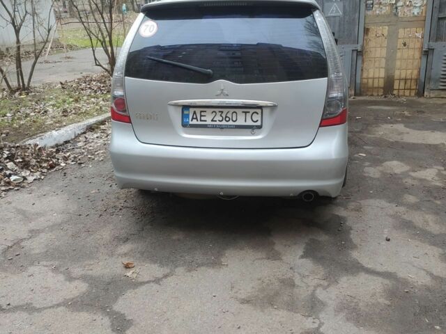 Серый Мицубиси Грандис, объемом двигателя 2.4 л и пробегом 260 тыс. км за 5700 $, фото 1 на Automoto.ua