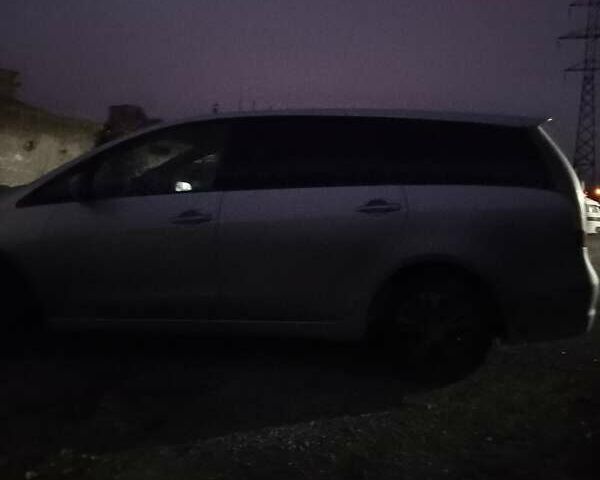 Серый Мицубиси Грандис, объемом двигателя 2.4 л и пробегом 261 тыс. км за 5490 $, фото 1 на Automoto.ua