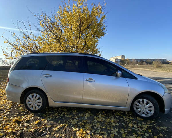 Серый Мицубиси Грандис, объемом двигателя 2.4 л и пробегом 293 тыс. км за 5200 $, фото 3 на Automoto.ua