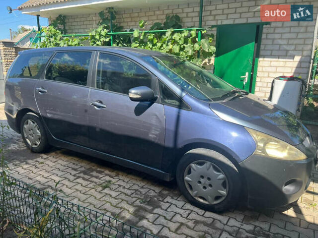 Серый Мицубиси Грандис, объемом двигателя 2.38 л и пробегом 271 тыс. км за 5400 $, фото 2 на Automoto.ua