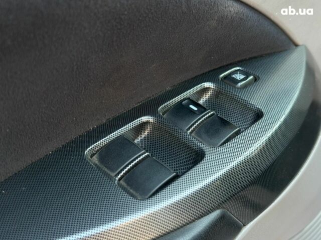 Серый Мицубиси Грандис, объемом двигателя 2.4 л и пробегом 201 тыс. км за 6990 $, фото 10 на Automoto.ua