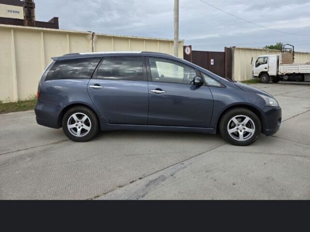 Сірий Міцубісі Грандіс, об'ємом двигуна 2.4 л та пробігом 291 тис. км за 3566 $, фото 5 на Automoto.ua