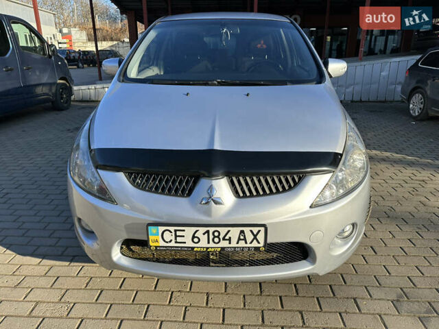 Серый Мицубиси Грандис, объемом двигателя 2.4 л и пробегом 276 тыс. км за 6800 $, фото 1 на Automoto.ua