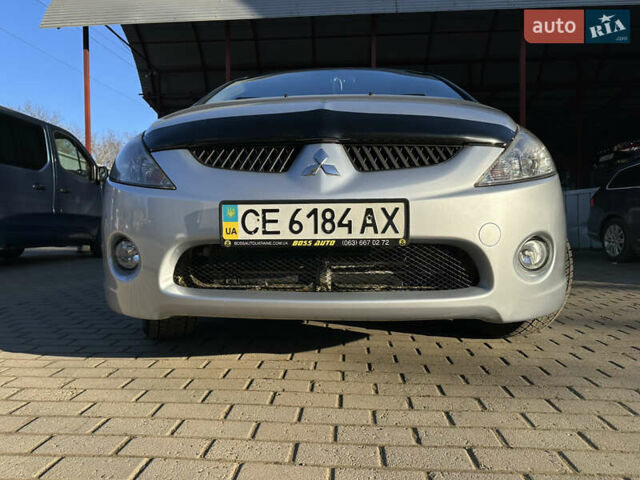 Серый Мицубиси Грандис, объемом двигателя 2.4 л и пробегом 276 тыс. км за 6800 $, фото 48 на Automoto.ua