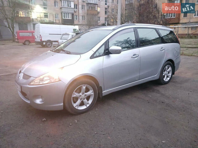 Серый Мицубиси Грандис, объемом двигателя 2.38 л и пробегом 254 тыс. км за 6900 $, фото 1 на Automoto.ua