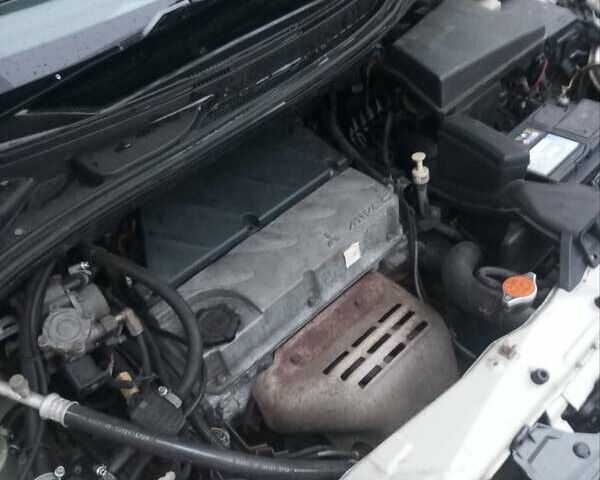 Сірий Міцубісі Грандіс, об'ємом двигуна 2.4 л та пробігом 430 тис. км за 5700 $, фото 7 на Automoto.ua