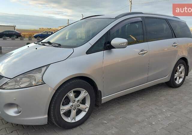 Сірий Міцубісі Грандіс, об'ємом двигуна 2.38 л та пробігом 296 тис. км за 7000 $, фото 1 на Automoto.ua