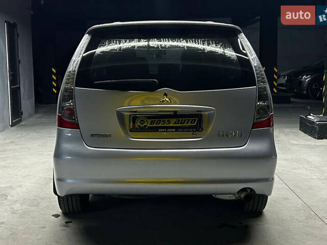 Серый Мицубиси Грандис, объемом двигателя 2.38 л и пробегом 274 тыс. км за 8300 $, фото 4 на Automoto.ua