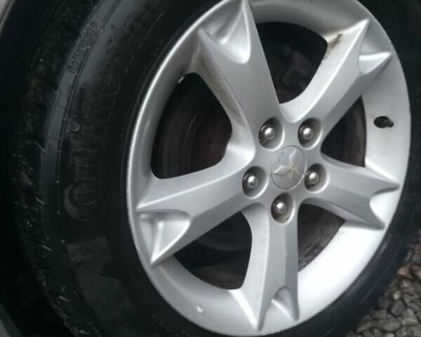 Сірий Міцубісі Грандіс, об'ємом двигуна 2.4 л та пробігом 430 тис. км за 5700 $, фото 2 на Automoto.ua