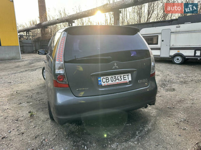 Сірий Міцубісі Грандіс, об'ємом двигуна 2.38 л та пробігом 207 тис. км за 6700 $, фото 11 на Automoto.ua