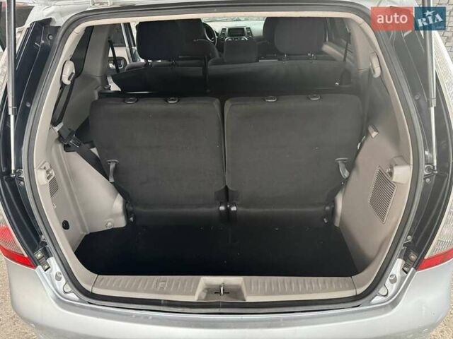 Серый Мицубиси Грандис, объемом двигателя 2.4 л и пробегом 190 тыс. км за 7099 $, фото 30 на Automoto.ua