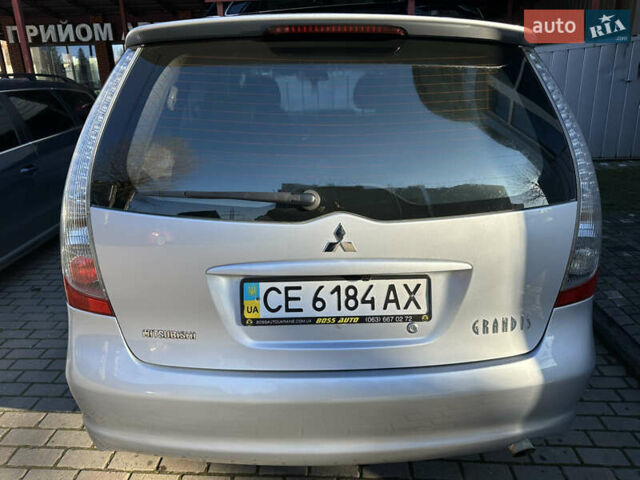 Серый Мицубиси Грандис, объемом двигателя 2.4 л и пробегом 276 тыс. км за 6800 $, фото 11 на Automoto.ua