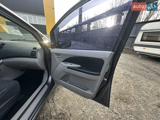 Сірий Міцубісі Грандіс, об'ємом двигуна 2.38 л та пробігом 207 тис. км за 6700 $, фото 30 на Automoto.ua