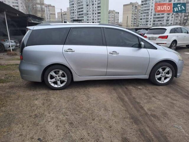 Серый Мицубиси Грандис, объемом двигателя 2.4 л и пробегом 351 тыс. км за 8000 $, фото 2 на Automoto.ua