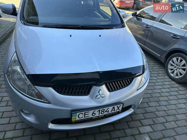 Серый Мицубиси Грандис, объемом двигателя 2.4 л и пробегом 276 тыс. км за 6800 $, фото 3 на Automoto.ua