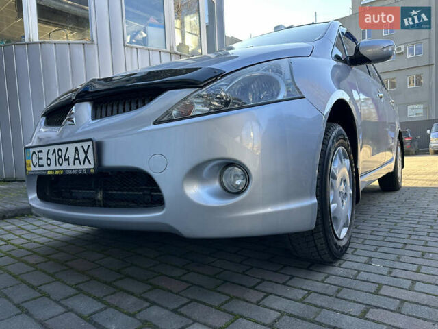 Серый Мицубиси Грандис, объемом двигателя 2.4 л и пробегом 276 тыс. км за 6800 $, фото 2 на Automoto.ua