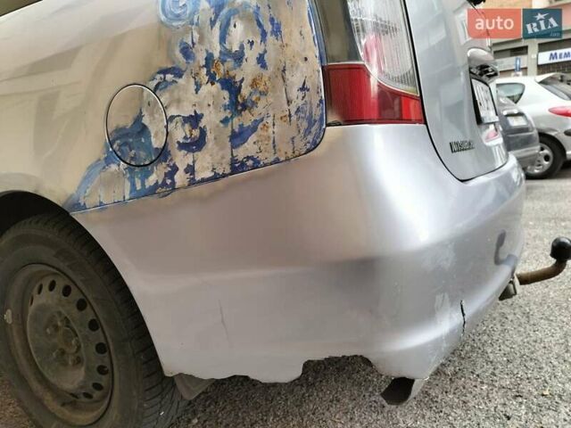 Серый Мицубиси Грандис, объемом двигателя 2.4 л и пробегом 480 тыс. км за 5800 $, фото 6 на Automoto.ua