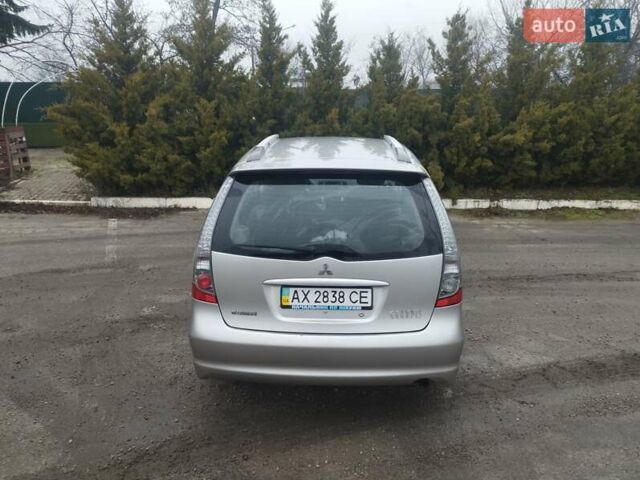 Серый Мицубиси Грандис, объемом двигателя 2.4 л и пробегом 153 тыс. км за 6900 $, фото 10 на Automoto.ua