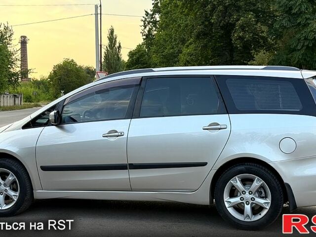 Серый Мицубиси Грандис, объемом двигателя 2.4 л и пробегом 93 тыс. км за 8800 $, фото 2 на Automoto.ua