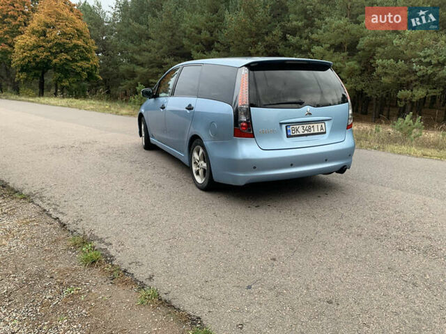 Синий Мицубиси Грандис, объемом двигателя 2.38 л и пробегом 320 тыс. км за 4800 $, фото 5 на Automoto.ua