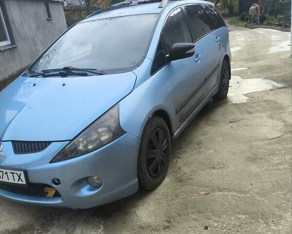 Синий Мицубиси Грандис, объемом двигателя 2.4 л и пробегом 350 тыс. км за 5450 $, фото 2 на Automoto.ua