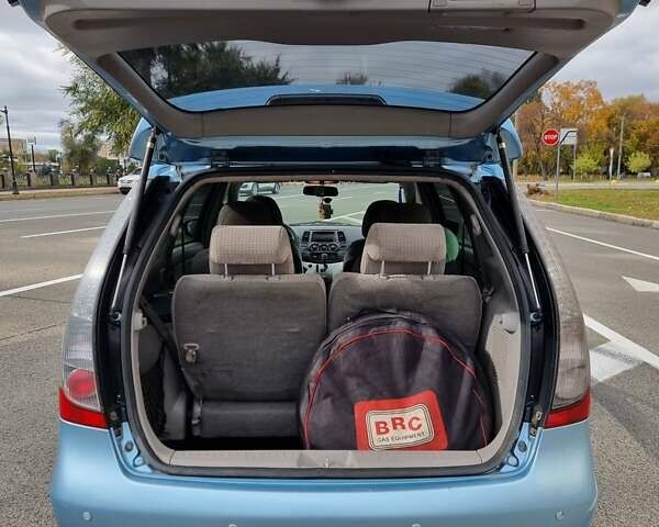 Синий Мицубиси Грандис, объемом двигателя 2.4 л и пробегом 307 тыс. км за 5700 $, фото 4 на Automoto.ua