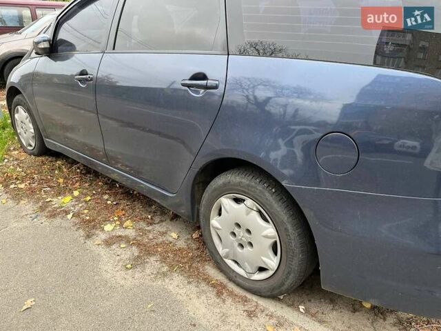 Синий Мицубиси Грандис, объемом двигателя 2.4 л и пробегом 266 тыс. км за 5200 $, фото 1 на Automoto.ua