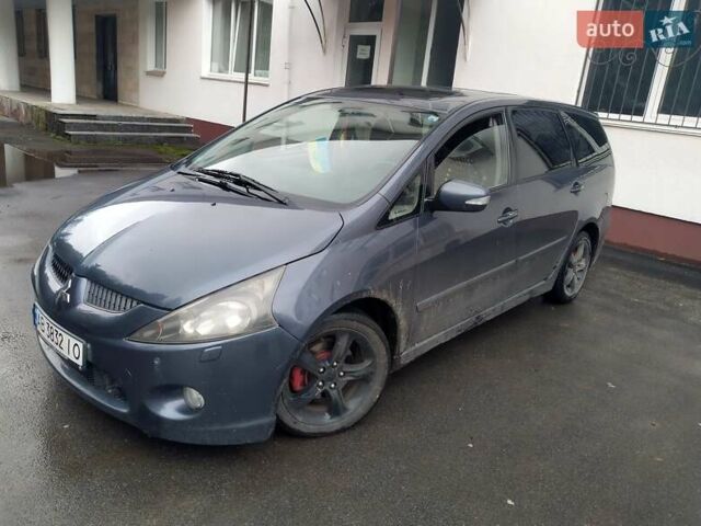 Синий Мицубиси Грандис, объемом двигателя 2 л и пробегом 267 тыс. км за 7000 $, фото 2 на Automoto.ua