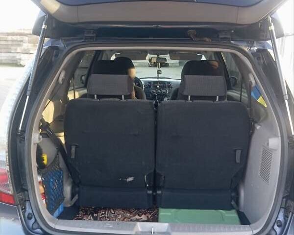 Синій Міцубісі Грандіс, об'ємом двигуна 2 л та пробігом 339 тис. км за 7000 $, фото 7 на Automoto.ua