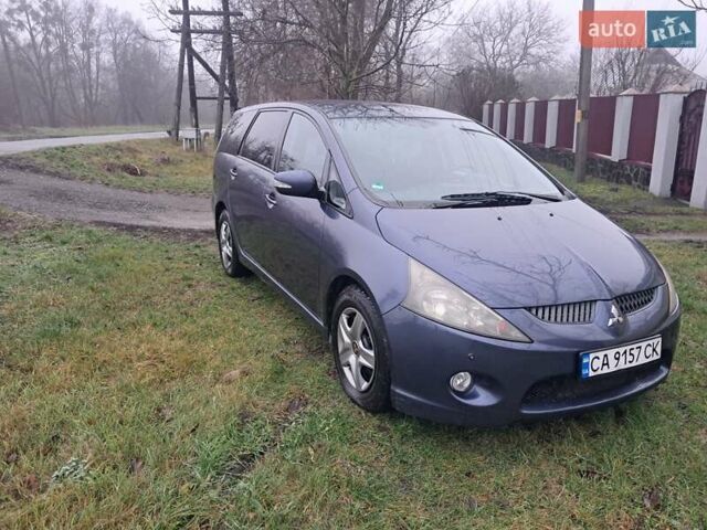 Синій Міцубісі Грандіс, об'ємом двигуна 2 л та пробігом 291 тис. км за 5400 $, фото 9 на Automoto.ua