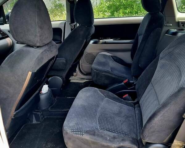 Синий Мицубиси Грандис, объемом двигателя 2.38 л и пробегом 220 тыс. км за 6500 $, фото 5 на Automoto.ua