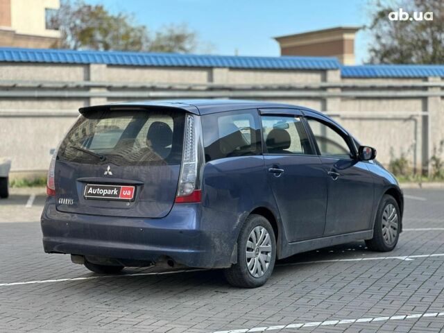 Синий Мицубиси Грандис, объемом двигателя 2.4 л и пробегом 250 тыс. км за 6490 $, фото 3 на Automoto.ua