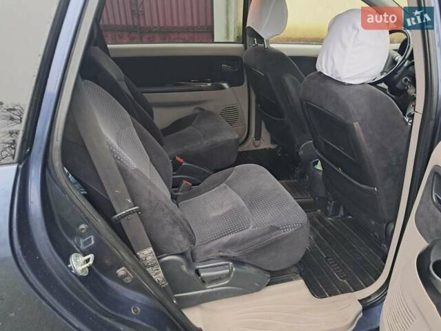 Синій Міцубісі Грандіс, об'ємом двигуна 2 л та пробігом 291 тис. км за 5400 $, фото 3 на Automoto.ua