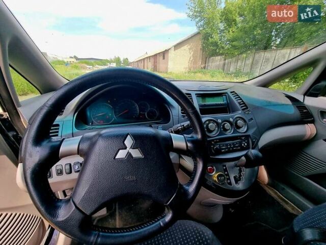 Синий Мицубиси Грандис, объемом двигателя 2.38 л и пробегом 220 тыс. км за 6500 $, фото 3 на Automoto.ua