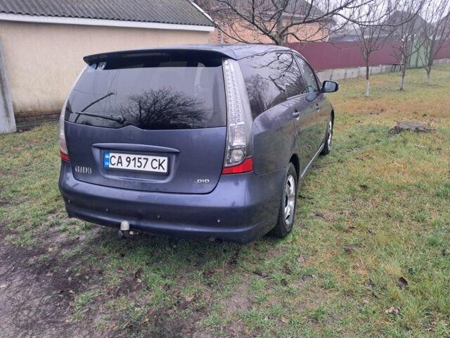 Синий Мицубиси Грандис, объемом двигателя 2 л и пробегом 291 тыс. км за 5400 $, фото 2 на Automoto.ua