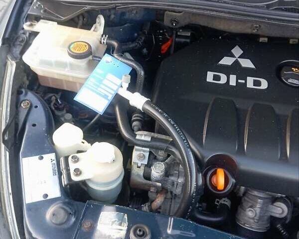 Синій Міцубісі Грандіс, об'ємом двигуна 2 л та пробігом 339 тис. км за 7000 $, фото 15 на Automoto.ua