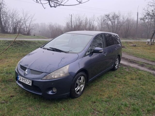 Синий Мицубиси Грандис, объемом двигателя 2 л и пробегом 291 тыс. км за 5400 $, фото 1 на Automoto.ua