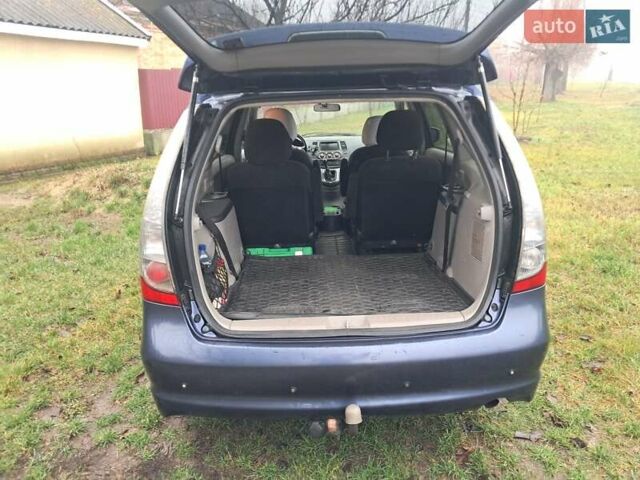 Синій Міцубісі Грандіс, об'ємом двигуна 2 л та пробігом 291 тис. км за 5400 $, фото 2 на Automoto.ua